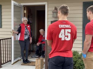 Dunn brothers, Badger football team up with Agrace Hospice Care to raise money and deliver meals