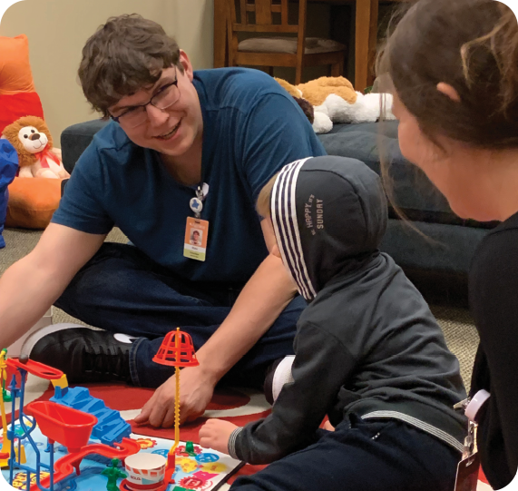 student volunteers at grief center