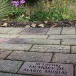 Here are examples of tribute bricks; the closest ones are in the 4-inch x 8-inch size.