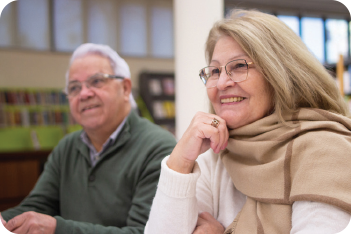 man and woman in a class setting