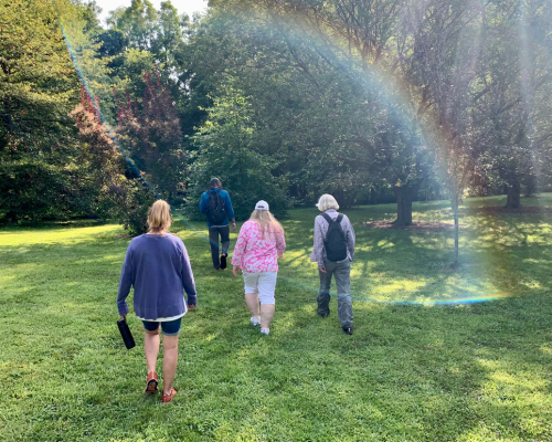 Group participants taking a walk during Grief on the Move
