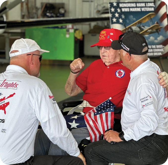 hank talking with veterans