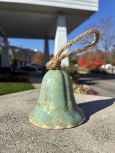 green bell with inscription